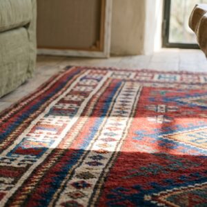 Bold Bright Red Antique Late 19th Century Tribal Geometric Caucasian Kazak Rug (SKU 19293) - in-room detail