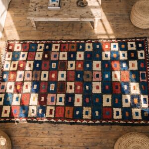 Bold Colorful Tribal Geometric Checkerboard Design Antique Persian Gabbeh Rug (SKU 19181) - styled overhead view