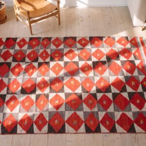 Antique Bold Red Primitive Tribal Geometric Native American Flatweave Navajo Rug (SKU 21182) - styled overhead view