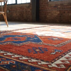 Bold Red Antique Tribal Geometric Late 19th Century Caucasian Lori Pambak Rug (SKU 20005) - in-room detail