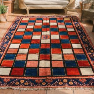 Bold Rich Color Graphic Checkerboard Pattern Antique Tribal Persian Gabbeh Wool Rug (SKU 18919) - styled overhead view