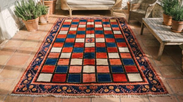 Bold rich color graphic checkerboard pattern antique tribal persian gabbeh wool rug 2 Bold rich color graphic checkerboard pattern antique tribal persian gabbeh wool rug (sku 18919) - styled overhead view