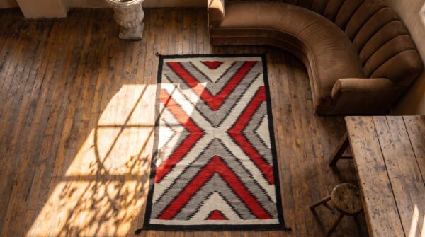 Bold tribal geometric antique flatweave native american navajo rug 2 Bold tribal geometric antique flatweave native american navajo rug (sku 19604) - styled overhead view