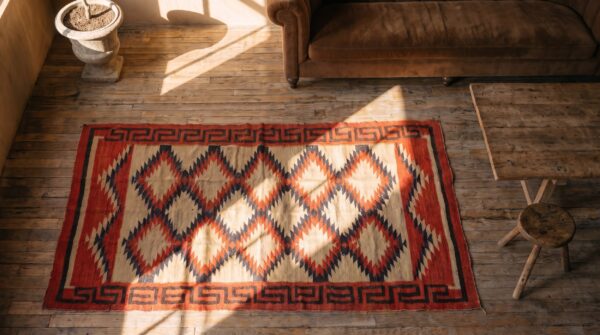 Bold tribal geometric flatweave antique native american navajo rug 2 Bold tribal geometric flatweave antique native american navajo rug (sku 21256) - styled overhead view