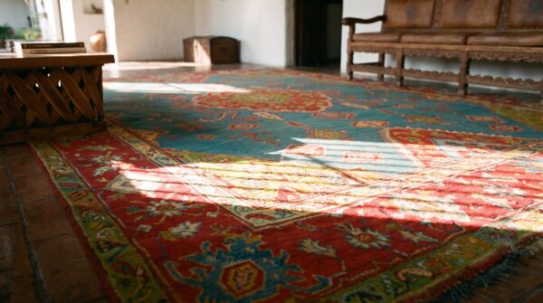 Bold tribal antique light blue turkish hand knotted wool pile medallion oushak rug 11 Bold tribal antique light blue turkish hand knotted wool pile medallion oushak rug (sku 24804) - in-room detail