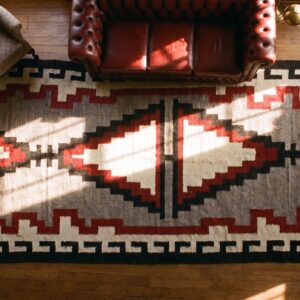 Antique Bold Tribal Pattern Native American Gray Flatwoven Navajo Rug (SKU 24448) - styled overhead view