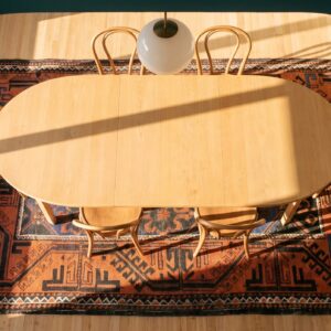Bold Tribal Antique Small Scatter Size Persian Baluch Area Rug (SKU 21646) - styled overhead view
