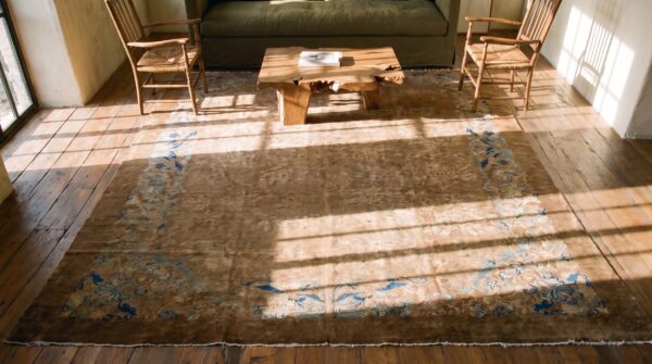Brown earth tone wool large rectangle allover floral hand knotted pile antique 1900s rug (sku 21005) - styled overhead view