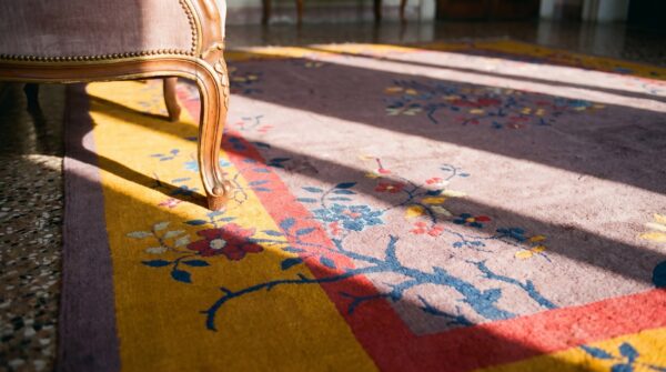 Antique wool brown earth tone yellow / gold orange hand knotted pile rug 6 Antique wool brown earth tone yellow / gold orange hand knotted pile rug (sku 23592) - in-room detail