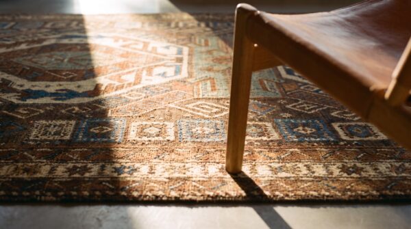 Brown earthy antique caucasian small scatter size wool shirvan rug 11 Brown earthy antique caucasian small scatter size wool shirvan rug (sku 25748) - in-room detail
