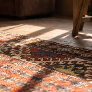 Casual Antique Coral Wool Pile Rustic Tribal Pattern Caucasian Kazak Rug (SKU 19881) - in-room detail