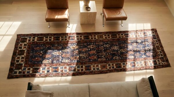Antique caucasian blue tribal paisley wool hallway runner kazak rug 2 Antique caucasian blue tribal paisley wool hallway runner kazak rug (sku 25142) - styled overhead view