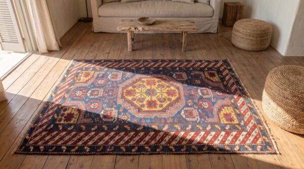 Antique caucasian geometric medallion wool hand knotted pile blue 1900s rug 2 Antique caucasian geometric medallion wool hand knotted pile blue 1900s rug (sku 21265) - styled overhead view