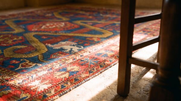 Antique caucasian geometric medallion square wool hand knotted pile blue 1890s rug 8 Antique caucasian geometric medallion square wool hand knotted pile blue 1890s rug (sku 21277) - in-room detail
