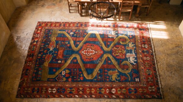 Antique caucasian geometric medallion square wool hand knotted pile blue 1890s rug 2 Antique caucasian geometric medallion square wool hand knotted pile blue 1890s rug (sku 21277) - styled overhead view