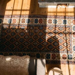 Antique Caucasian Karabagh Small Scatter Size Wool Rug (SKU 19143) - styled overhead view
