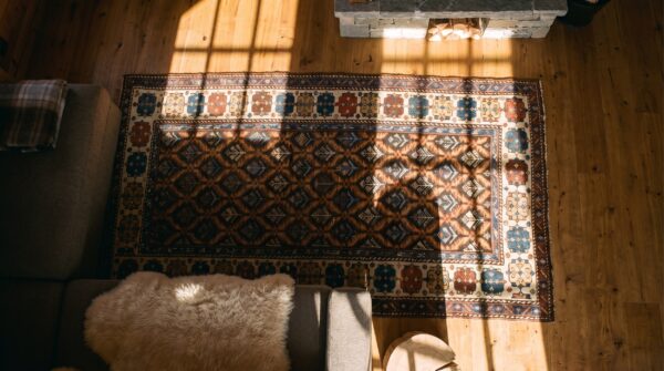 Antique caucasian karabagh small scatter size wool rug 2 Antique caucasian karabagh small scatter size wool rug (sku 19143) - styled overhead view