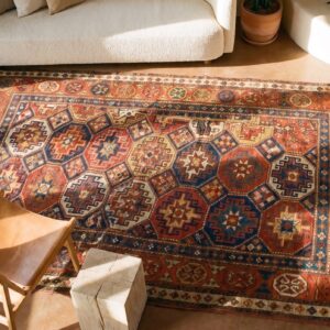 Antique Caucasian Kazak Rug 4'×8'2" Multi Geometric, Rose Pink Border, Circa 1890 (SKU 19098) - styled overhead view