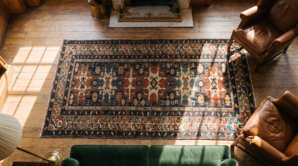 Antique caucasian shirvan hallway runner wool blue rug (sku 18451) - styled overhead view