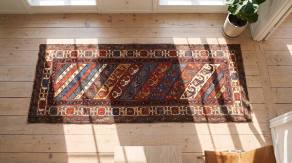 Antique caucasian shirvan tribal paisley hallway runner rug 2 Antique caucasian shirvan tribal paisley hallway runner rug (sku 21541) - styled overhead view