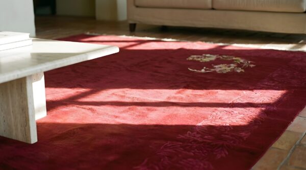 Antique chinese - art deco wool 1920s room size red knotted rectangle rug 6 Antique chinese - art deco wool 1920s room size red knotted rectangle rug (sku 22268) - in-room detail