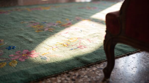 Antique chinese art deco floral knotted green rug 7 Antique chinese art deco floral knotted green rug (sku 24819) - in-room detail