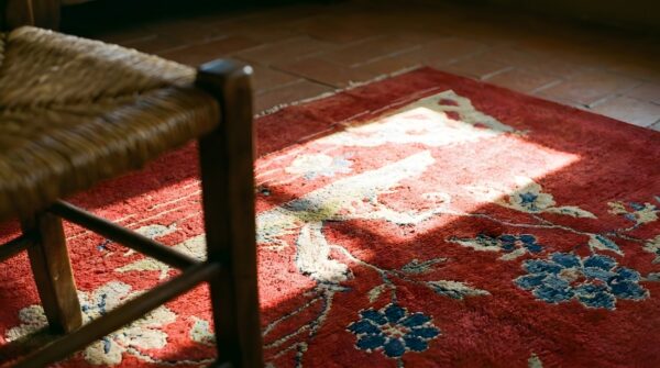 Antique chinese art deco floral red 1920s rug 9 Antique chinese art deco floral red 1920s rug (sku 24419) - in-room detail