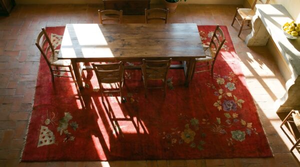 Antique chinese art deco floral red 1920s rug 2 Antique chinese art deco floral red 1920s rug (sku 24419) - styled overhead view
