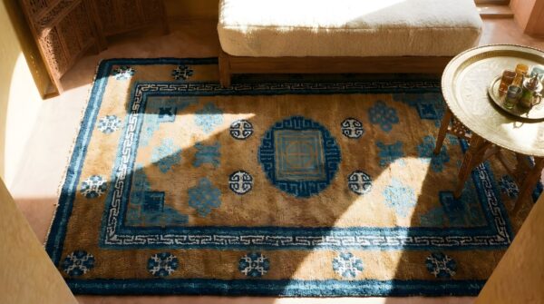 Antique chinese - baotou brown 1920s rug 2 Antique chinese - baotou brown 1920s rug (sku 23248) - styled overhead view