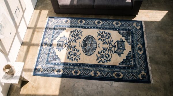 Antique chinese - baotou chinese ivory 1920s rug 2 Antique chinese - baotou chinese ivory 1920s rug (sku 22004) - styled overhead view