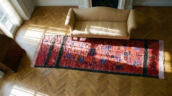 Antique chinese floral red square 1890s textile art rug 2 Antique chinese floral red square 1890s textile art rug (sku 23839) - styled overhead view