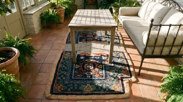 Antique chinese horse saddle cover blue color rug (sku 25398) - styled overhead view