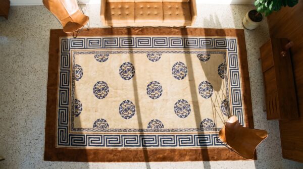 Antique chinese peking carpet 8'×13'6" ivory field, fox brown border, notable kangxi style, 19th century (sku 19436) - styled overhead view