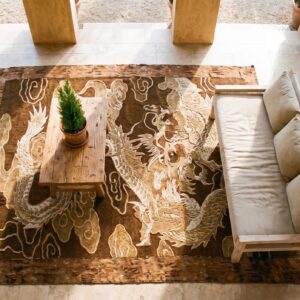 Antique Chinese Textile Small Wool & Silk Brown Dragon Embroidery Wall Hanging (SKU 21684) - styled overhead view