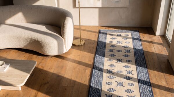 Antique chinese white and blue hand-knotted wool peking hallway runner rug 2 Antique chinese white and blue hand-knotted wool peking hallway runner rug (sku 20995) - styled overhead view