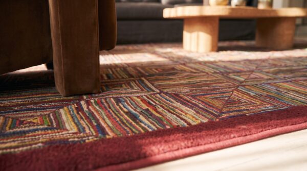 Colorful geometric log cabin squares antique american hooked rug 9 Colorful geometric log cabin squares antique american hooked rug (sku 25074) - in-room detail