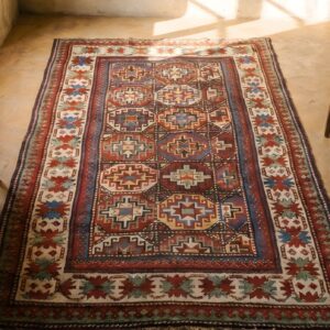Colorful Tribal Crab Border Antique Colorful Caucasian Moghan Rug (SKU 22255) - styled overhead view