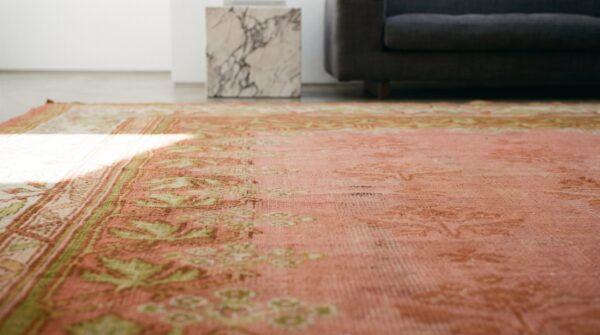 Coral color room size antique irish donegal arts and crafts design rug 9 Coral color room size antique irish donegal arts and crafts design rug (sku 18505) - in-room detail