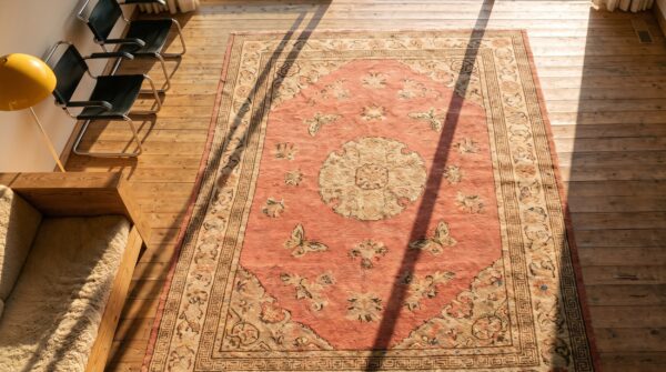 Antique coral east turkestan khotan wide gallery size wool rug 2 Antique coral east turkestan khotan wide gallery size wool rug (sku 19309) - styled overhead view