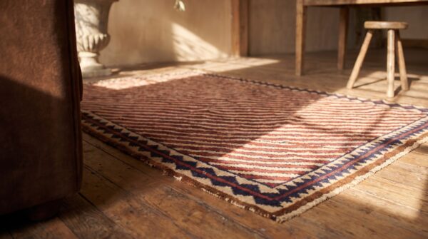 Coral ivory antique geometric tribal stripe design persian gabbeh small scatter size rug 9 Coral ivory antique geometric tribal stripe design persian gabbeh small scatter size rug (sku 19179) - in-room detail