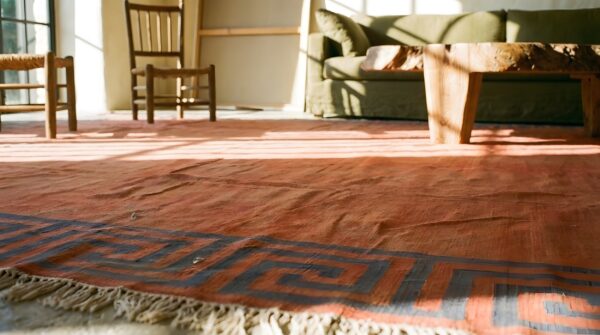 Coral rustic open field antique indian room size cotton dhurrie rug 8 Coral rustic open field antique indian room size cotton dhurrie rug (sku 22081) - in-room detail