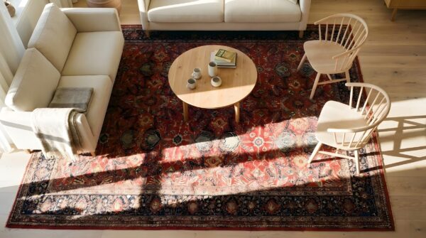 Antique coral sarouk farahan persian floral medallion rug 2 Antique coral sarouk farahan persian floral medallion rug (sku 22873) - styled overhead view