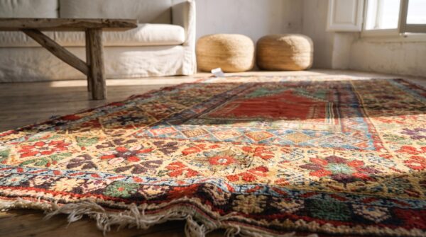 Coral antique tribal geometric islamic prayer design late 19th century turkish knoya mujur rug 11 Coral antique tribal geometric islamic prayer design late 19th century turkish knoya mujur rug (sku 21194) - in-room detail