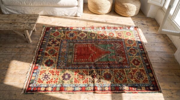Coral antique tribal geometric islamic prayer design late 19th century turkish knoya mujur rug 2 Coral antique tribal geometric islamic prayer design late 19th century turkish knoya mujur rug (sku 21194) - styled overhead view