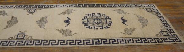 Antique cream wool oriental mongolian hallway runner rug 2 Antique cream wool oriental mongolian hallway runner rug (sku 23951) - styled overhead view