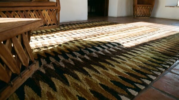 Dazzling geometric design antique native american navajo earth tone rug 9 Dazzling geometric design antique native american navajo earth tone rug (sku 23767) - in-room detail