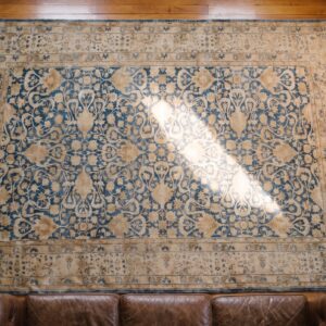 Decorative Cream and Light Blue Color Antique Persian Allover Floral Pattern Tabriz Rug (SKU 20190) - styled overhead view