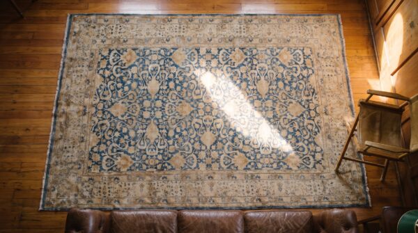 Decorative cream and light blue color antique persian allover floral pattern tabriz rug 2 Decorative cream and light blue color antique persian allover floral pattern tabriz rug (sku 20190) - styled overhead view