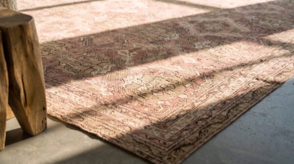 Decorative light color allover tribal pattern antique oversized turkish oushak carpet (sku 20826) - in-room detail