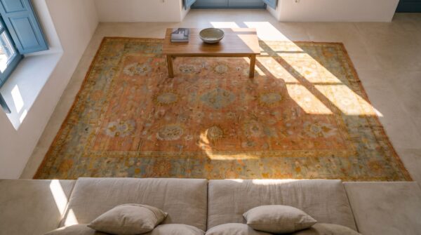 Decorative warm light coral color antique large scale turkish oushak room size rug 2 Decorative warm light coral color antique large scale turkish oushak room size rug (sku 23370) - styled overhead view